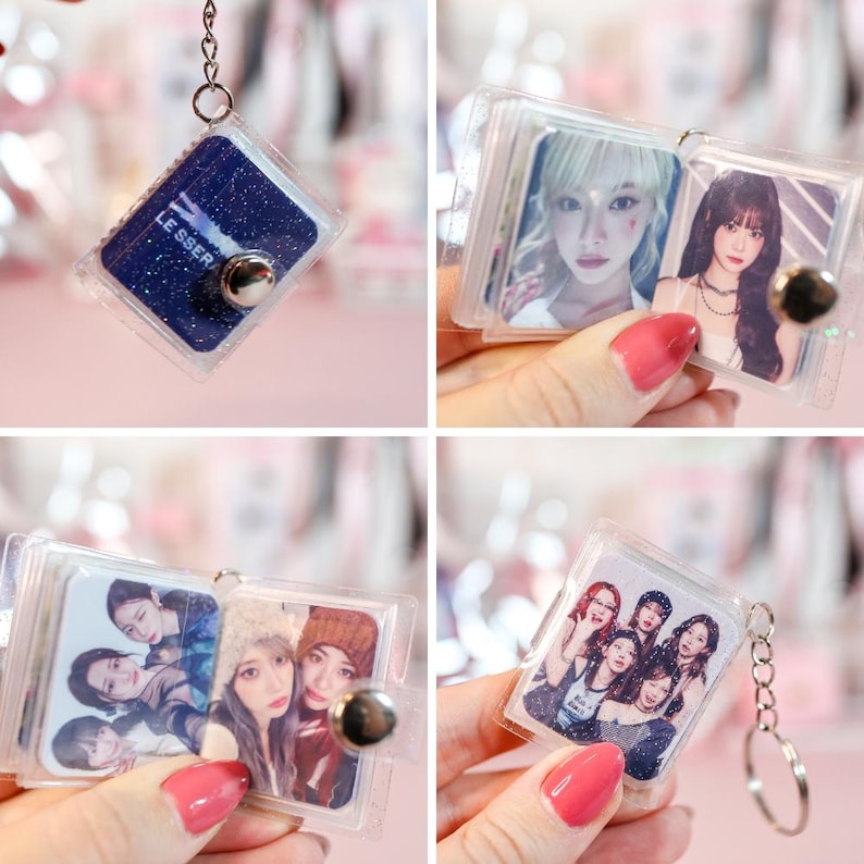 May include: Clear acrylic keychain with a silver-colored metal clasp. The keychain features a small photo album with multiple images of a group of people. The album is held together with a silver-colored metal button.