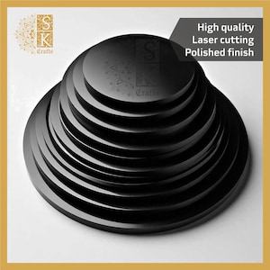 May include: A stack of black, circular objects with a polished finish. The objects are laser cut and of high quality. The image also includes the text "High quality, Laser cutting, Polished finish". The SK Crafts logo is visible.