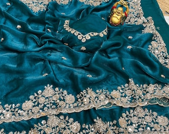 Launch Grand party wear saree in original gold beeds work