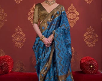 P c silk with ikkat design with hard marmo finish with tassles