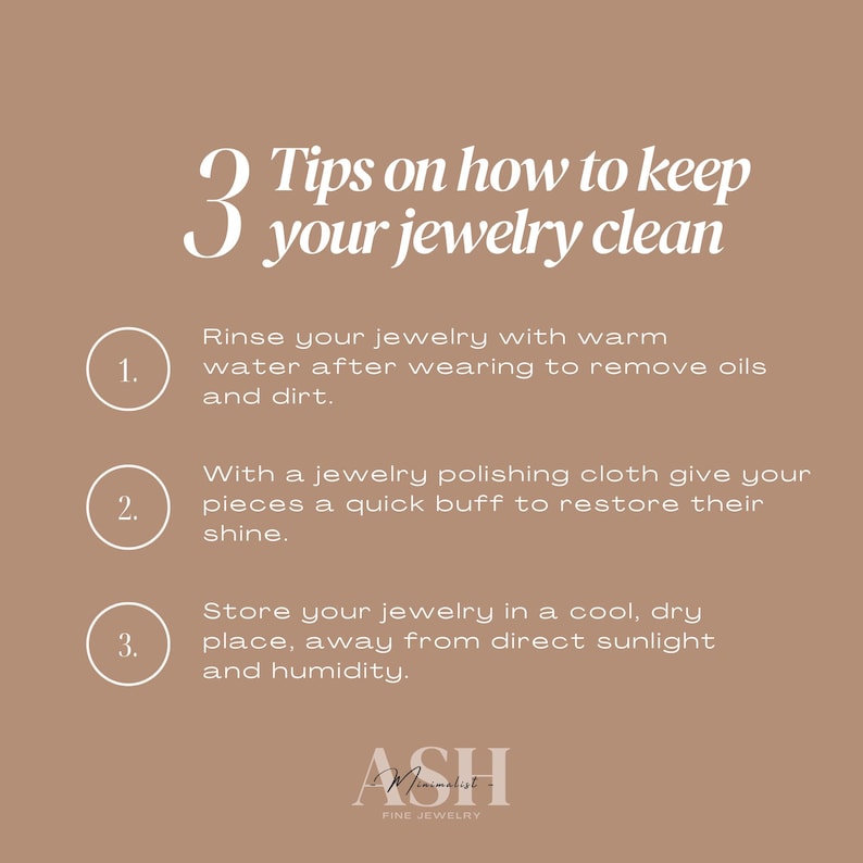 May include: A tan graphic with white text providing three tips on how to keep jewelry clean. The tips include rinsing with warm water, polishing with a cloth, and storing in a cool, dry place. The Ash Fine Jewelry logo is at the bottom.