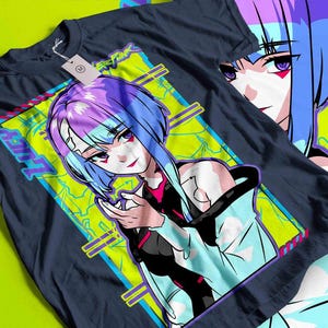 May include: A white ceramic mug with a black handle and the text "But First, Coffee" in a handwritten style. The mug is on a white surface. The mug is approximately 4 inches tall.