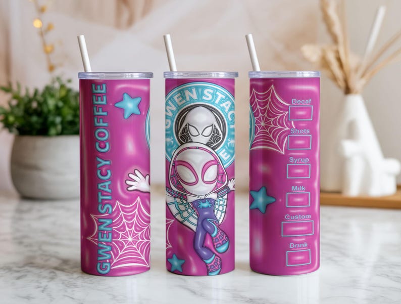 May include: A set of three pink insulated tumblers with white straws. The tumblers feature designs related to Gwen Stacy, including a spider web, a star, and the text "GWEN STACY COFFEE". One tumbler has a drink customization chart.