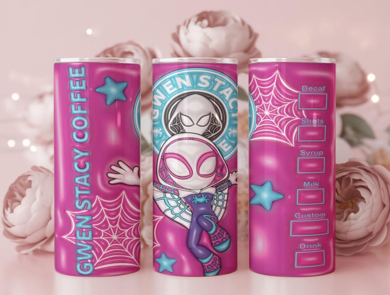 May include: A set of three pink insulated tumblers featuring a Gwen Stacy Spider-Woman design. One tumbler has the text "GWEN STACY COFFEE", another has a character illustration, and the third has a drink customization chart. Each tumbler has a web design.