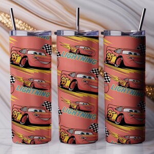 May include: Three stainless steel tumblers with a repeating pattern of the character Lightning McQueen from the movie Cars. The design features the number 95, a checkered flag, and the word "Lightning" on a coral background. Each tumbler has a silver straw.