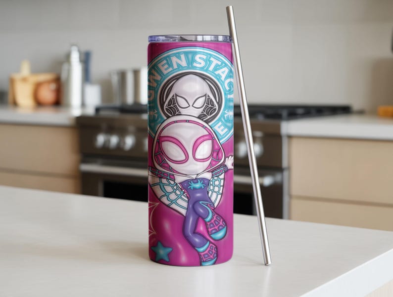 May include: A tall, cylindrical tumbler with a vibrant design featuring the character Gwen Stacy. The tumbler is primarily pink with a teal and white circular emblem. A silver-colored straw rests against the side. The tumbler is approximately 8 inches tall.