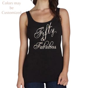 May include: Black tank top with the text "Fifty & Fabulous" in a cursive font. The text is embellished with small, sparkling accents. The words "Colors may be Customized" are in the upper left corner.