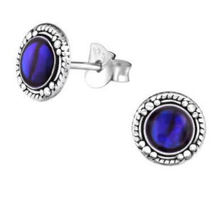 May include: A pair of round stud earrings featuring a central iridescent blue stone set in sterling silver. The silver setting displays a decorative beaded and twisted rope border. The earring post is clearly marked with the 925 silver hallmark.