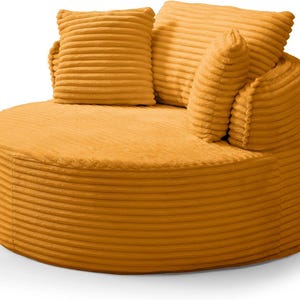 Puede incluir: Un sill&oacute;n redondo de pana color mostaza con cojines a juego. El sill&oacute;n tiene un respaldo bajo y reposabrazos, y los cojines son suaves y acogedores. La tela de pana tiene una textura acanalada, lo que a&ntilde;ade inter&eacute;s visual. Una opci&oacute;n de asiento c&oacute;moda.