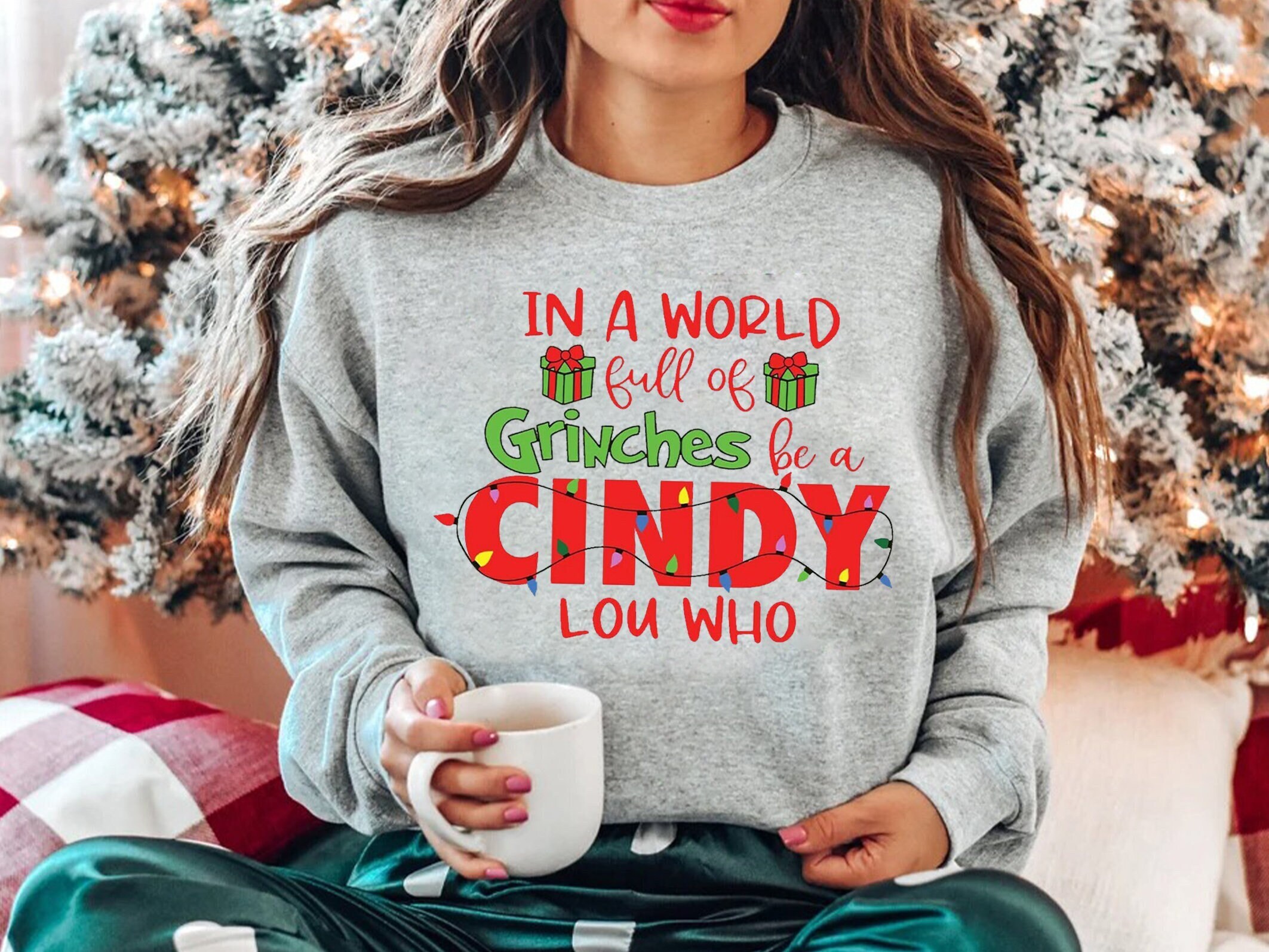 Discover In A World Full Of Grinches Be A Cindy Lou Who Sweatshirt