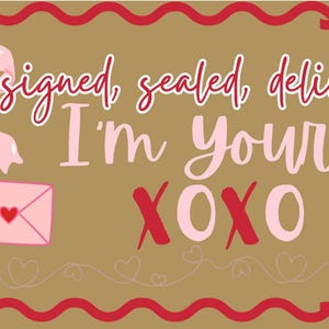 May include: A Valentine's Day themed graphic with the text "signed, sealed, delivered, I'm Yours XOXO". The design includes pink envelopes, a bow, and hearts on a gold background with a red border.