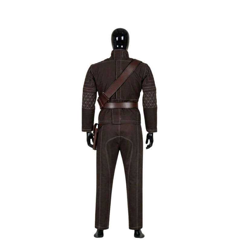 May include: A brown costume displayed on a black mannequin. The outfit includes a jacket, pants, belt, and shoulder strap. The jacket has a high collar and geometric stitching on the shoulders. The pants have white stitching.