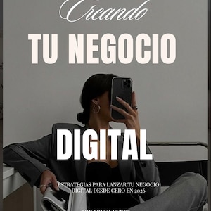 Op de afbeelding: Afbeelding toont de tekst "Creando TU NEGOCIO DIGITAL" in het wit, met een persoon die een telefoon vasthoudt. Daaronder staat "ESTRATEGIAS PARA LANZAR TU NEGOCIO DIGITAL DESDE CERO EN 2026" en "POR BRUNA NUNEZ @REALMARKETINGCONPROPOSITO".