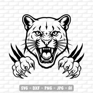 May include: A monochrome illustration of a cougar's head, snarling with open jaws and claws extended. The image includes the text "SVG - DXF - PNG - JPG - AI" at the bottom, indicating different file formats.
