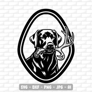 May include: Black and white illustration of a Labrador Retriever dog holding antlers in its mouth, framed within an oval. The image includes the text "SVG - DXF - PNG - JPG - AI" at the bottom.