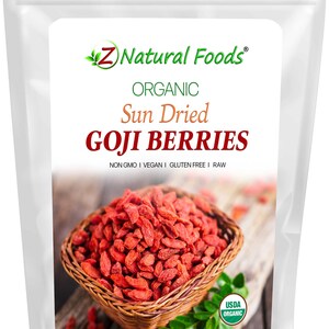 May include: A white pouch of Z Natural Foods Organic Sun Dried Goji Berries. The package features a basket of red goji berries, with text indicating the product is non-GMO, vegan, gluten-free, and raw. Net weight is 1 lb (454 g).