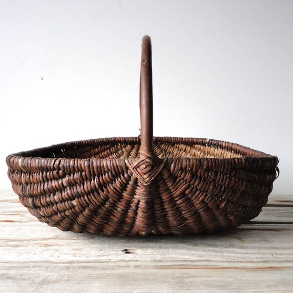r e s e r v e d Handwoven Basket with Bent Wood Handle