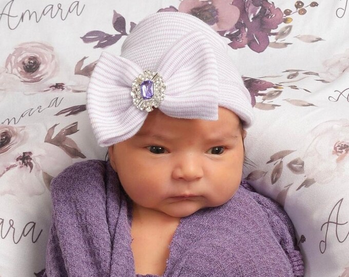 Featured listing image: Newborn Hospital Hat, lavender and white stripes with a purple rhinestone center on the bow, baby hat, bebe, Lil Miss Sweet Pea Boutique