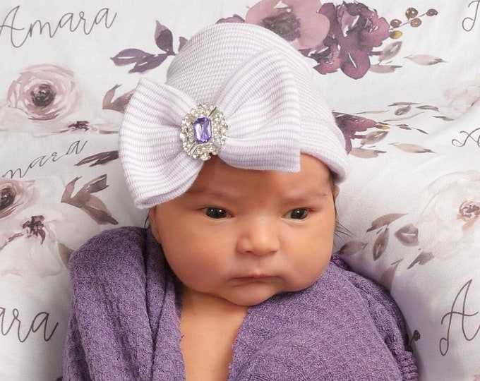 Featured listing image: Newborn Hospital Hat, lavender and white stripes with a purple rhinestone center on the bow, baby hat, bebe, Lil Miss Sweet Pea Boutique