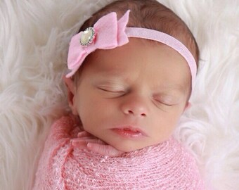 Pink Felt Bow Headband on 3,8 inch elastic with a pearl button for newborns, photo shoots, birthdays, everyday wear by Lil Miss Sweet Pea