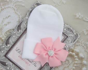 White fitted top newborn hospital hat with a pink ribbon bow, take home outfit, hospital beenie, by Lil Miss Sweet Pea