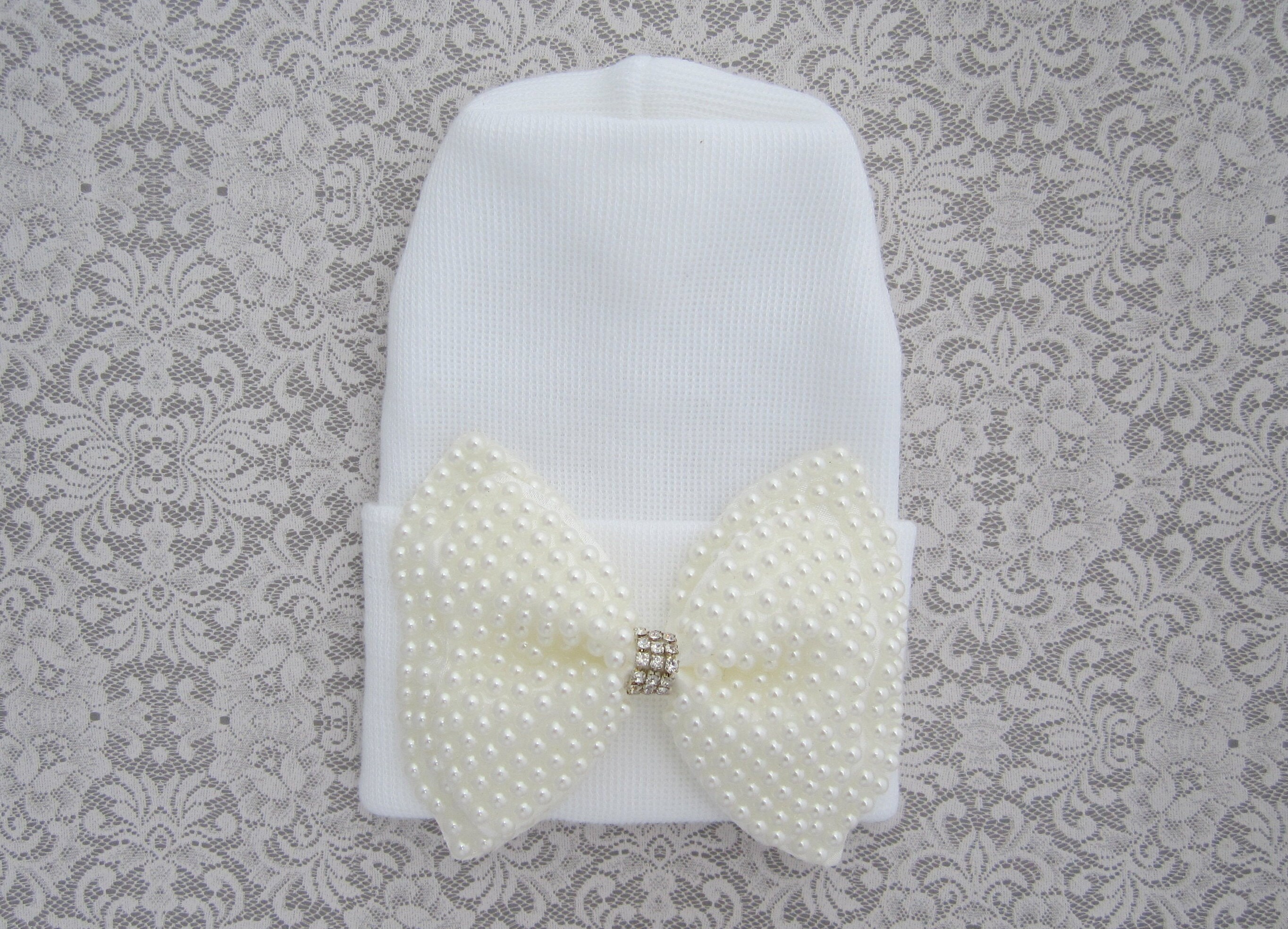 Newborn hospital hat white with pearl bow attachment with