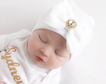 White Newborn Hospital Hat with a gold rhinestone button, baby hat, hospital hat, brand new baby, beanie from Lil Miss Sweet Pea Boutique