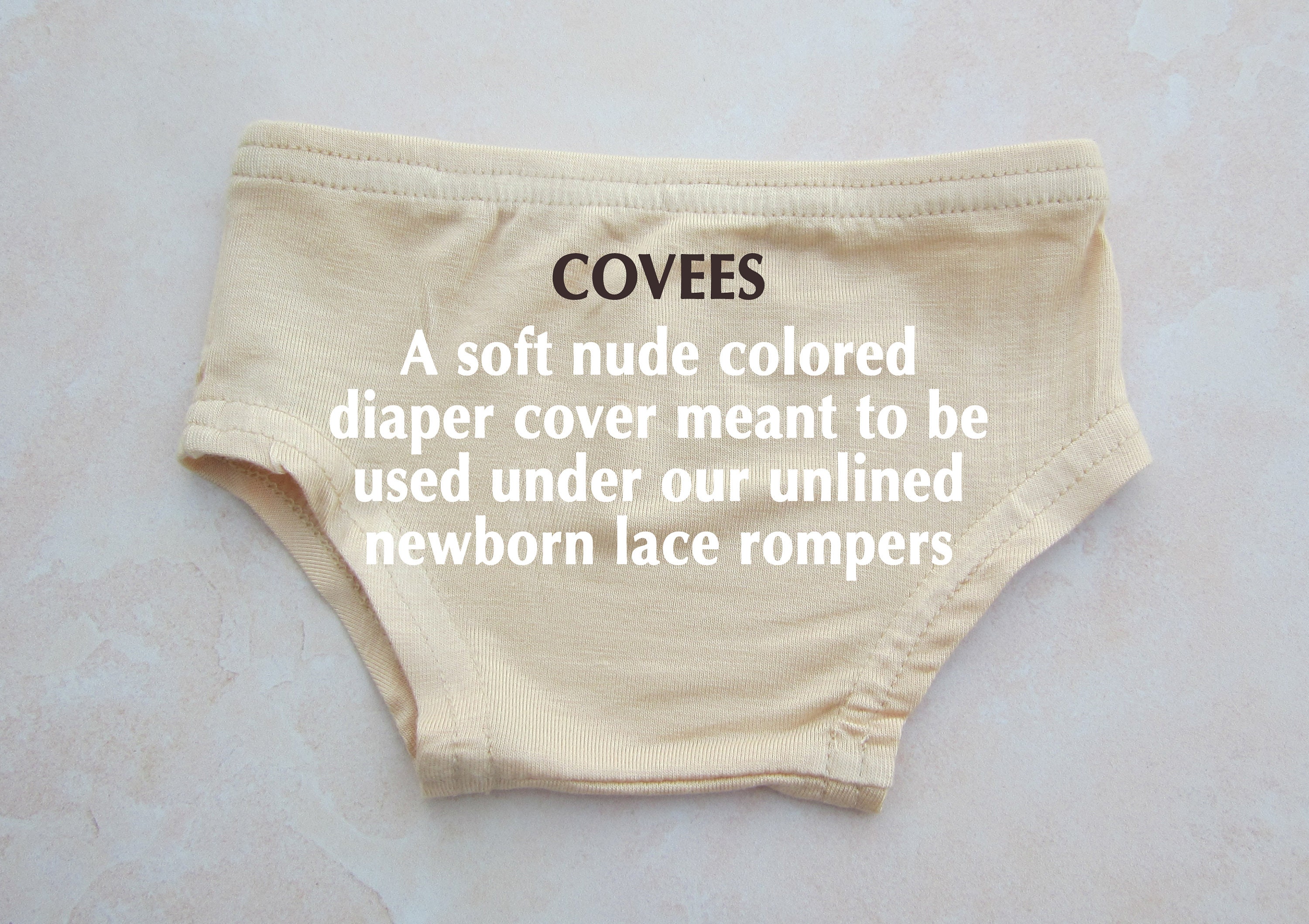 COVEES - A soft nude colored diaper cover meant to be used under