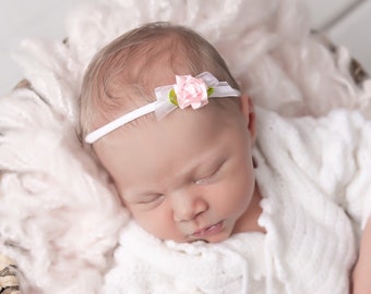 White stretch knit headband with lace, ribbon and a pink rose, bebe, by Lil Miss Sweet Pea
