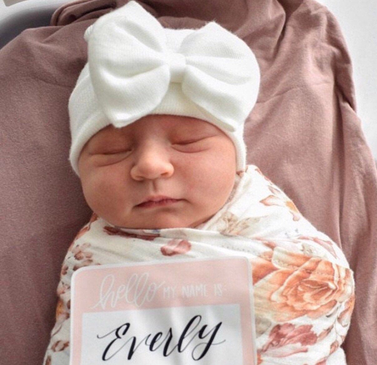 white infant hat