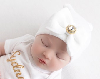 White Newborn Hospital Hat with a gold rhinestone button, baby hat, hospital hat, brand new baby, beanie from Lil Miss Sweet Pea Boutique