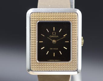 Orologio Omega De Ville rettangolare del 1975: calibro 625 a carica manuale, revisionato, cinturino originale.