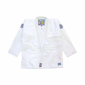May include: White Jiu-Jitsu gi with blue and purple detailing. The gi has a V-neck, reinforced seams, and patches on the shoulders and chest. The label displays the brand name "Shoyoroll Kimonos".