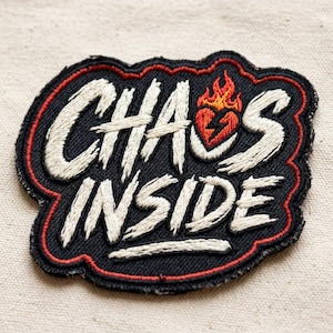May include: Embroidered patch with the words "CHAOS INSIDE" in white script on a black background. A red heart with a lightning bolt and flames is above the letter "S". The patch has a red border.