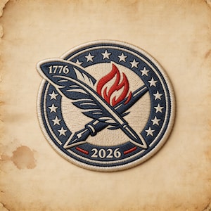 May include: Embroidered patch featuring a quill and pen crossed with a flame in the center. The patch is circular with a blue border, white stars, and the years 1776 and 2026. The design is on a tan background.