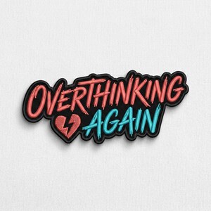 May include: Embroidered patch with the words "OVERTHINKING AGAIN" in red and blue, with a black border. The word "OVERTHINKING" is arched above "AGAIN". A broken heart graphic is between the words. The patch is on a white background.