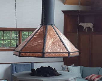 Steel and copper hood.
