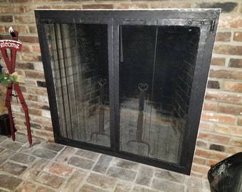 Bi Fold Glass Fireplace doors
