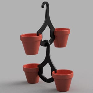 May include: A black metal plant holder with four small terracotta pots. The pots are arranged in a vertical design, suspended from a curved hook at the top. The plant holder is designed to be hung.
