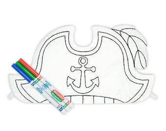 May include: A white felt pirate hat with an anchor design, ready to be colored in with three markers: red, blue, and green.