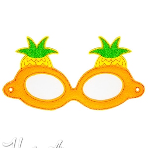 Może przedstawiać: Pomarańczowe i żółte okulary z ananasowymi wzorami po bokach. Okulary są wykonane z filcu i mają białe tło.