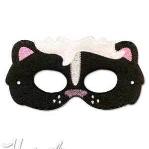 May include: Black and white felt mask with pink accents, shaped like a skunk with a white stripe down the back. The mask has eye holes and a nose.
