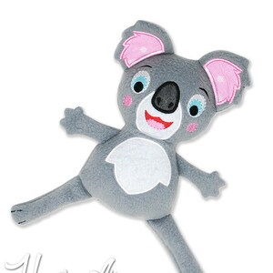 May include: A gray koala plush toy with pink ears and a friendly face. The koala has a white belly and a black nose.