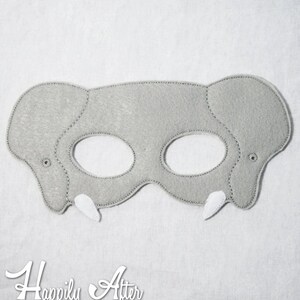 May include: Gray felt elephant mask with white felt tusks and eye holes.