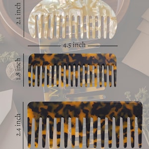 May include: Three hair combs with tortoiseshell and pearlescent patterns. The top comb is semi-circular, 2.1 inches high and 4.5 inches wide. The middle comb is 1.8 inches high. The bottom comb is 2.4 inches high and 5.8 inches wide.
