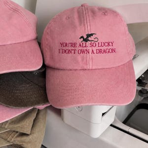 Funny Dragon Hat, You're All So Lucky I Don't Own A Dragon Cap, Sarcastic Fantasy Lover Gift, Bookish Dad Hat, Romantasy Reader Apparel