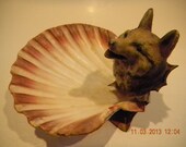 Just plain odd..Metal mounted wolf head on shell assemblage...pin tray or calling card tray perhaps