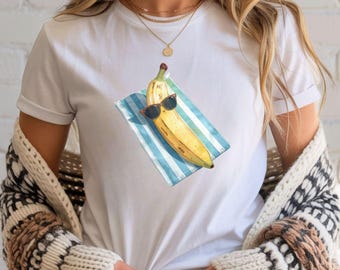 Banana on Beach Towel Tee | Summer Fruit Illustration T-Shirt