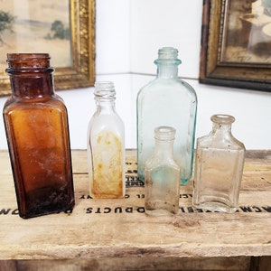 Vintage Glass Bottle Set: Mixed Colors, Aged Home Decor