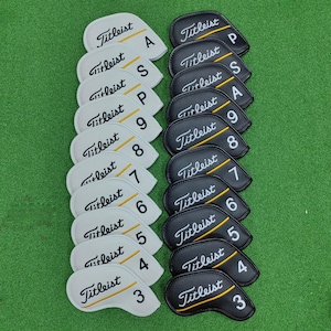 May include: A set of three ceramic mugs with a speckled, matte finish. The mugs are in shades of cream, light gray, and dark gray. Each mug has a simple, minimalist design, perfect for coffee or tea.